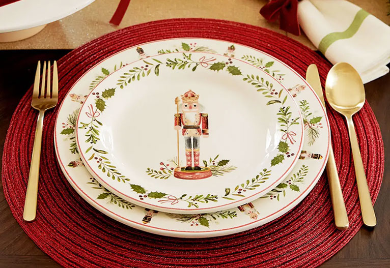 Nutcracker Christmas dining set with gold cutlery.