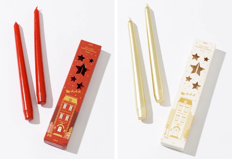 Dusk Christmas taper candles in red and gold.