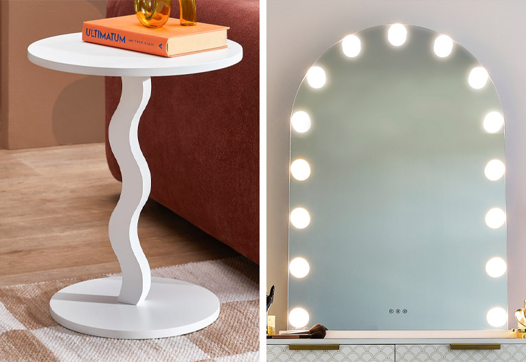 White wavy side table and a hollywood makeup mirror.