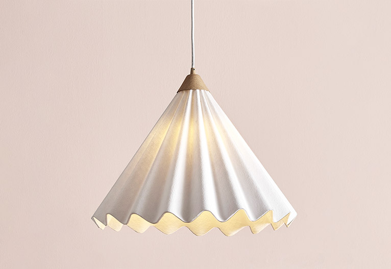 Scallop-edged pendant light.