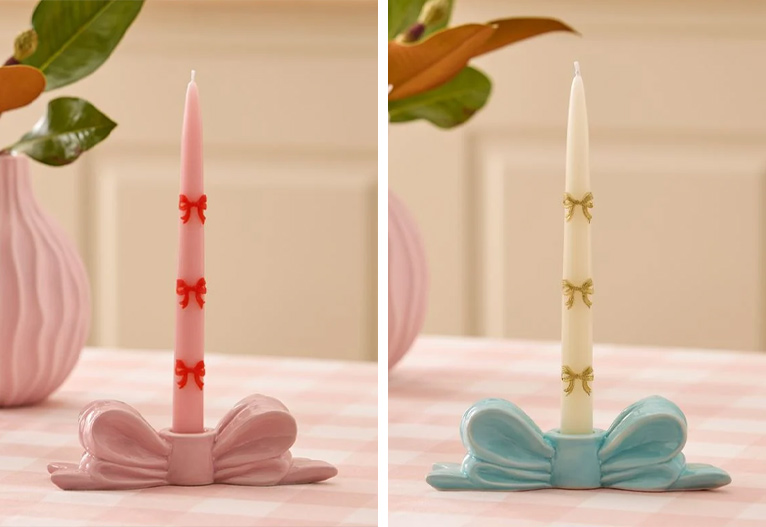 Adairs Bow Taper Candle Holders in pink and blue.