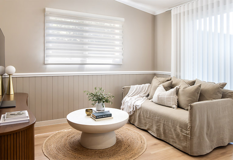 Small lounge area with a grey sofa.