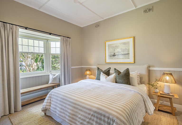 Master bedroom with bay window.