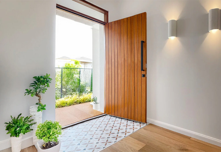 Modern timber linear entrance door.