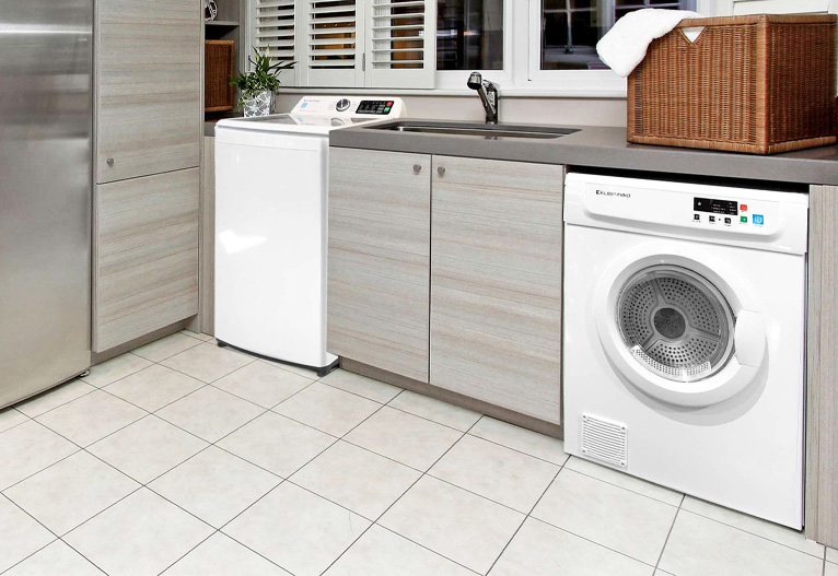 Kleenmaid vented dryer in a modern grey laundry.