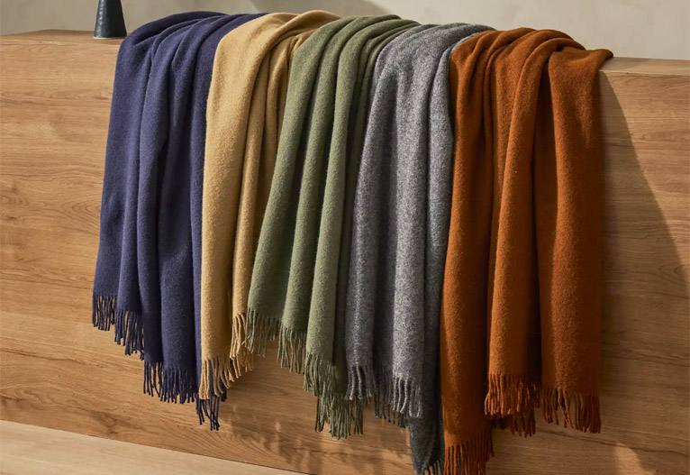 Weave nevis lambswool throw rugs.