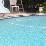 Rain on a backyard pool.