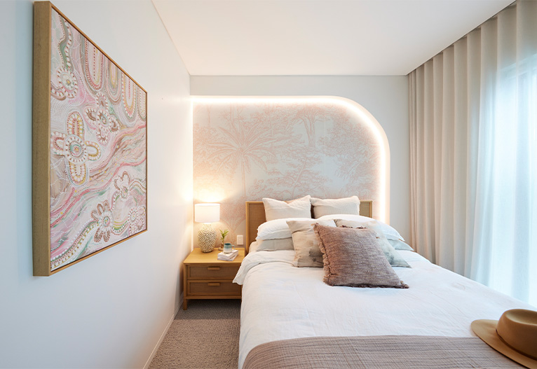 Guest bedroom with curved feature wall.