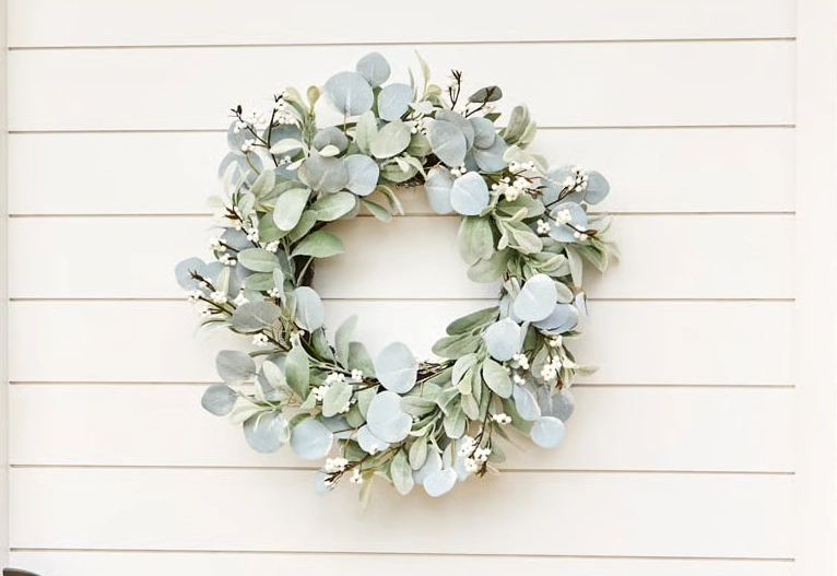 Adairs eucalyptus wreath on a weatherboard home.