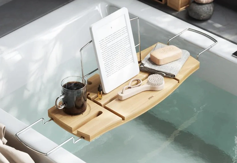 Aquala Bath Caddy over a white tub.