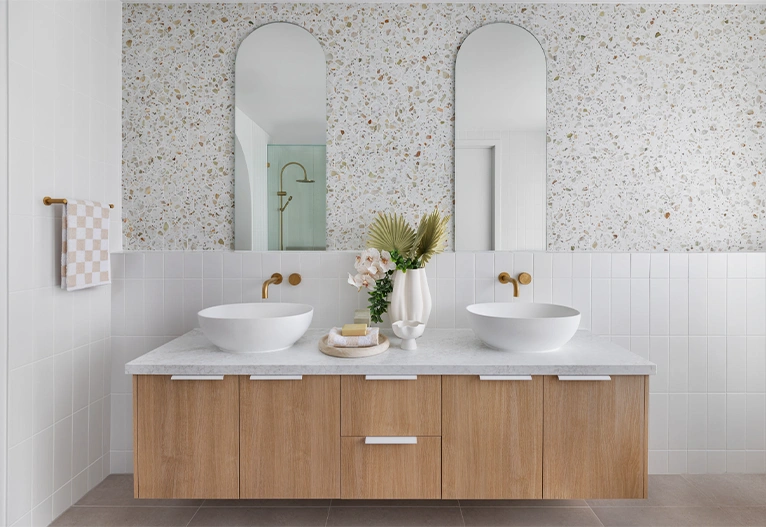 Curved bathroom mirrors.