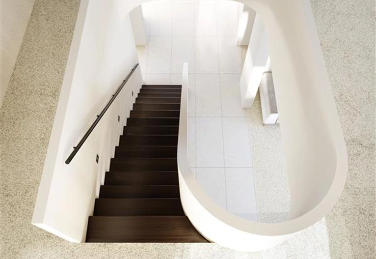 Metricon staircase with curved features.