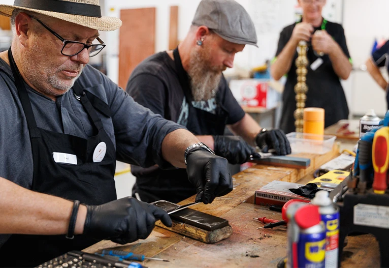 People doing the WD-40 Repair Challenge.